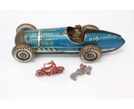 A Marx tinplate No. 410 racing car and two lead motorbikes (3) 