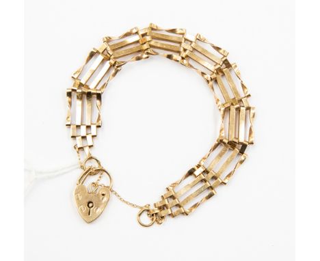 A 9ct gold gate-link bracelet and padlock, approx 9.7gms, London 1978 with original receipt 