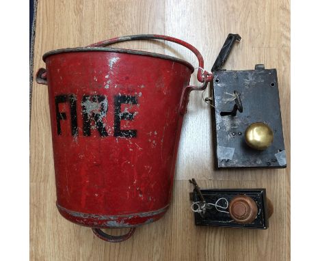 A Georgian style lock mechanism, another four locks and a Vintage fire buckets 