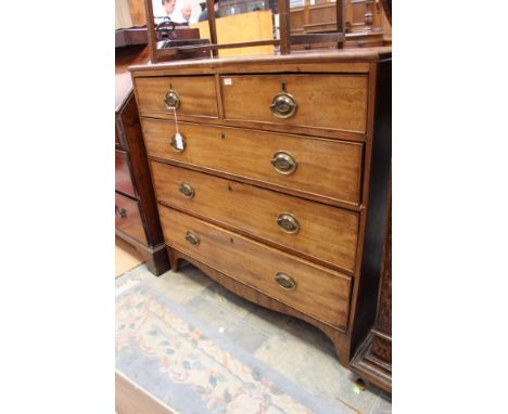 A George II mahogany chest of drawers, fitted with two short over three long graduated drawers, raised on bracket feet 