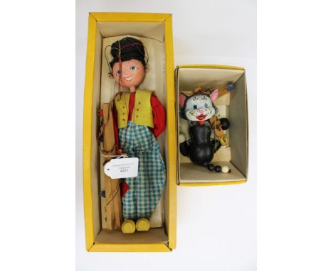 A Pelham puppet CAT (original box) together with a Russian boy (box) (2) 