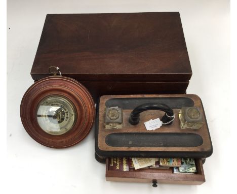An oak writing slope together with a mahogany desk stand and a small barometer (3)
