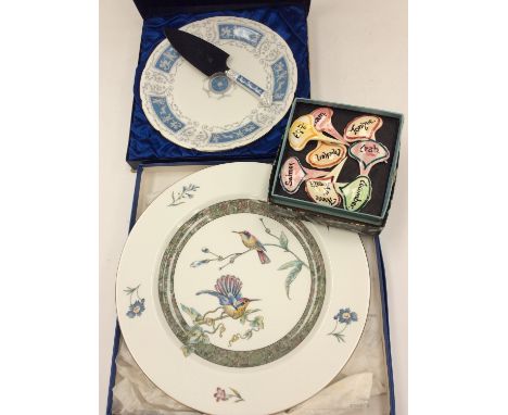 A boxed Wedgwood charger, decorated with birds; together with a boxed Coalport cake plate and server and a set of ceramic san