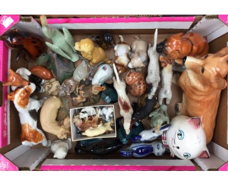 A quantity of ceramics and glass animals, dogs, cats, etc, to include Poole pottery (one box) 