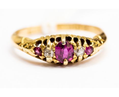 A ruby and diamond boat head ring, set with three rubies and two small diamonds in between, size J, total gross weight approx