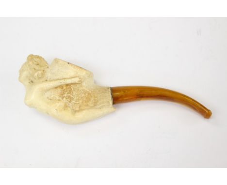 A Meerschaum pipe, carved with a lady 