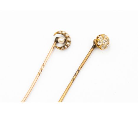 Two stick pins, one diamond set, the other seed pearl crescent brooch 