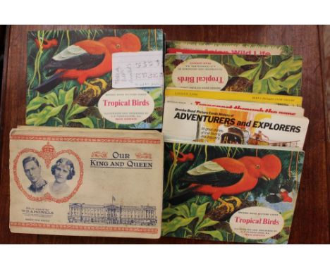 A collection of 25 tea card albums, including 1937 Commemorative George VI issue and various vintage album series