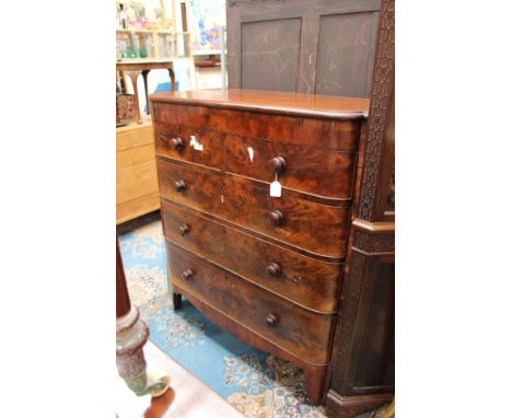 A mid Victorian mahogany chest of drawers, of large proportions, fitted with two short over three long graduated drawers, sta