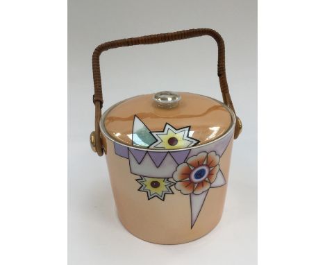 A 1930s Noritake Art Deco orange lustre cracker jar 