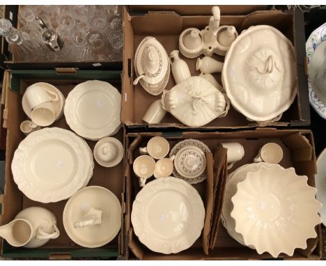 A large collection of Royal Creamware including reticulated pieces, tureen, cruet bottles, large floral shaped bowl, cruet st