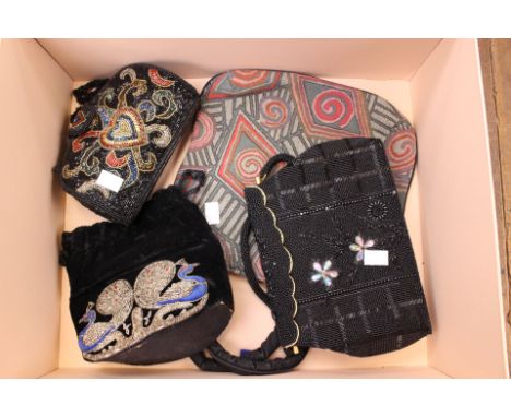 Four vintage handbags in Louis Vuitton box