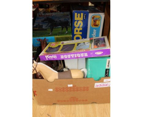 A boxed Action Man Horse with Saddle, a boxed Marx Valour the Armoured Horse, and unboxed rider, a boxed Action Girl Pony Rid