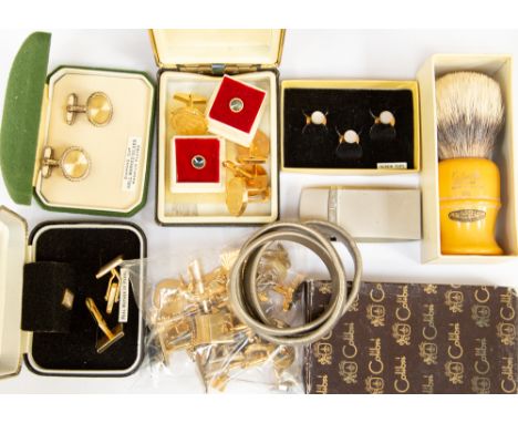 An assortment of cufflunks and studs; Calibri lighter; etc 