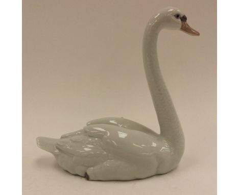 A Lladro Swan, ref 5230 imprinted to base 