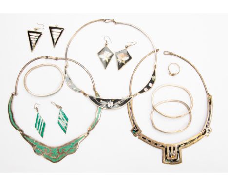 A collection of Mexican silver jewellery with mother of pearl inlays, onyx and ceramic, including earrings, necklaces and ear