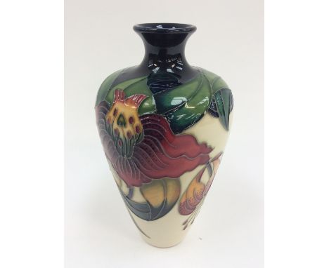 A Moorcroft vase signed and numbered, boxed, Anna Lilly pattern, first quality