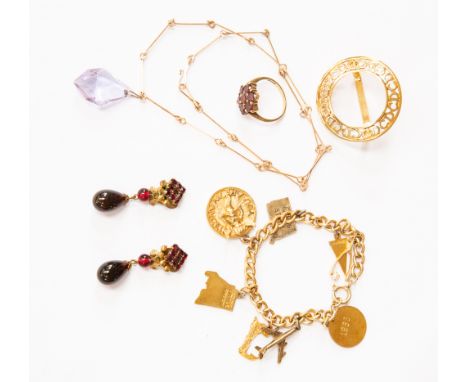 A Christian Dior scarf ring, boxed, a 1920s/30s yellow metal and blue glass necklace, a yellow metal charm bracelet, with a 1
