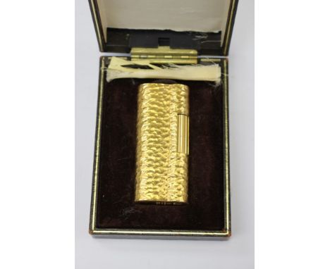 A Dunhill lighter, original leather box and detail, 20 microns gold plated - with guarantee 'S' version, circa 1970s or late 