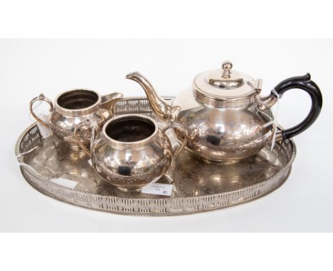 A three piece silver plated tea service; together with a gallery tray (4) 