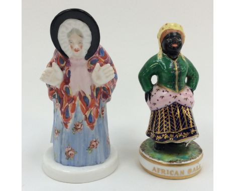 A Stevenson & Hancock African figurine and A Stevenson & Hancock candle snuffer on stand, both s/d/restored (2) 