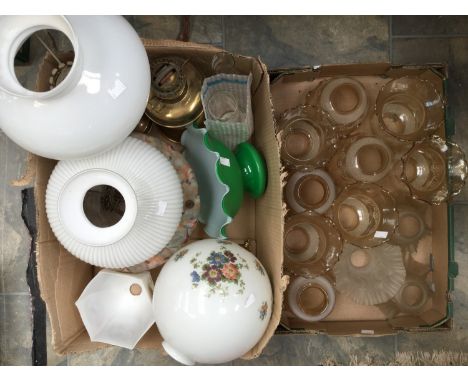 Two brass oil lamps, a 1930s light fitting and a quantity of glass light shades (two boxes) 