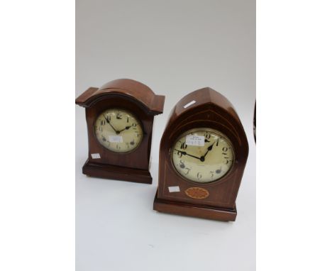 A 1930s style domed and mahogany cased Gilbert mantle clock with inlaid patera and another Gilbert mahogany mantle clock, pla