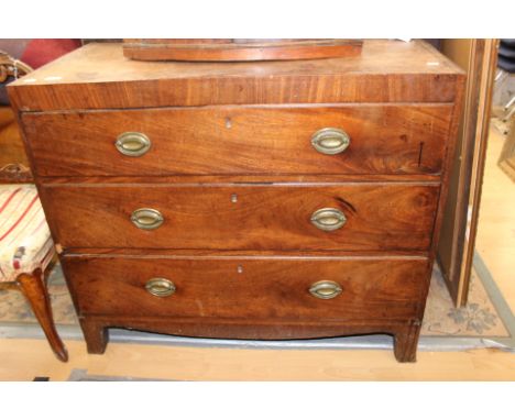 A George III mahogany chest of drawers, altered, originally the base section of a larger piece, fitted with three drawers, re
