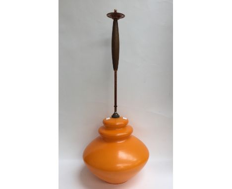 Iconic mid 20th Century ceiling light with orange glass shade