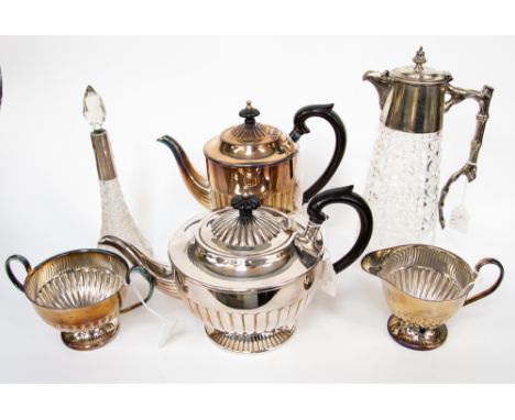 A four piece silver plated tea service; together with a claret jug and perfume bottle (6) 