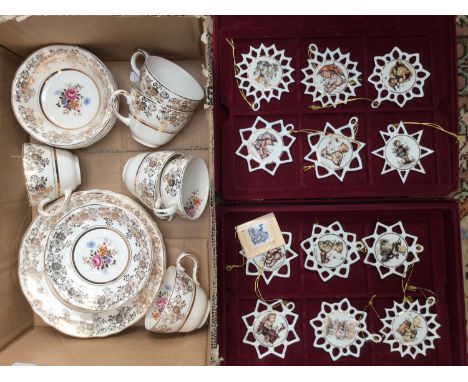 A case of Hummel Christmas tree decorations, together with a gilt and floral tea set (1 box)