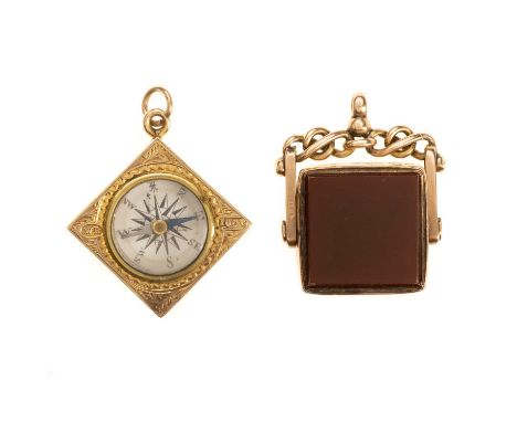 GOLD COMPASS PENDANT ALONG WITH AN AGATE SWIVEL FOB, the compass in ten carat gold, the swivel fob in nine carat goldQty: 12.