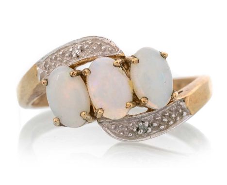 OPAL THREE STONE RING, in nine carat gold, size MQty: 2.4g