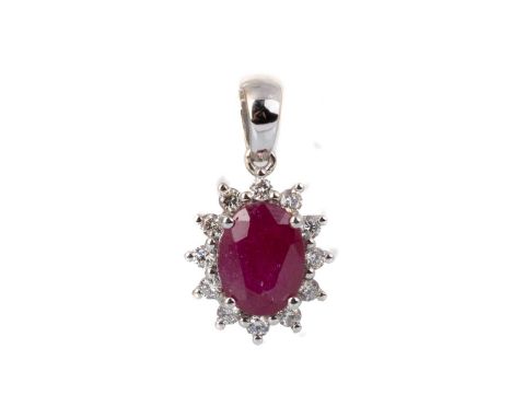 RUBY AND DIAMOND CLUSTER PENDANT, the oval of approximately 1.22 carats, within a halo of diamonds totalling approximately 0.