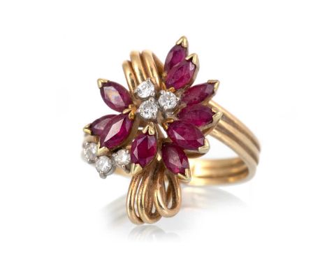 RUBY AND DIAMOND SPRAY RING, set with marquise rubies and small diamonds, marked for fourteen carat gold, size O 1/2Qty: 5.2g