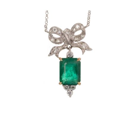 EMERALD AND DIAMOND PENDANT, set with a step cut emerald of approximately 4.59 carats, beneath a diamond set bow, the diamond