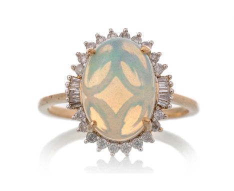 OPAL AND DIAMOND RING, set with cabochon opal within a halo of diamonds, in nine carat gold, size VLightly worn. Diamonds inc