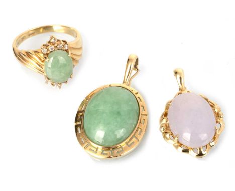 TWO GOLD PENDANTS AND A RING, the jade pendants each unmarked, the ring in nine carat goldQty: 14.7g gross