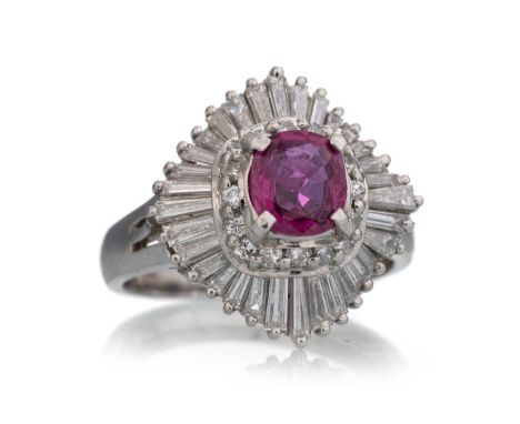 RUBY AND DIAMOND BALLERINA RING, set with a central ruby surrounded by tapered baguette cut diamonds totalling approximately 