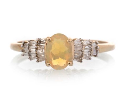 OPAL AND DIAMOND RING, set with central cabochon opal, on tiered diamond set shoulders, in nine carat gold, size QQty: 1.8gLi