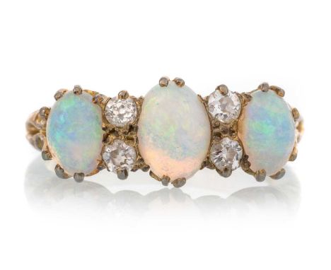 VICTORIAN OPAL AND DIAMOND BOAT RING, set with cabochon opals interspaced by pairs of diamonds, unmarked, size QQty: 3.9g
