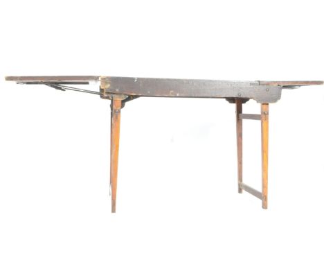 An early 20th Century WWI First World War period believed Field Surgeon's folding operating table. Pine construction, with fo