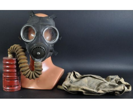 An original WWII Second World War British Army issued Service Respirator / Gas Mask. 1941 dated to tin, with broad arrow stam