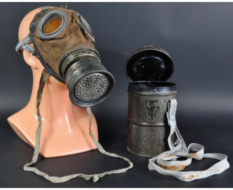 A scarce original WWI First World War Imperial German Army respirator / gas mask. Complete example, including its original ca