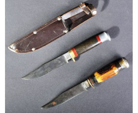 Edged Weapons - two vintage daggers / knives, to include; a WWII Second World War period Sheffield made dagger with ringed hi