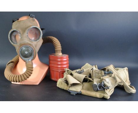 An original WWII Second World War British Army issued Service Respirator / Gas Mask. 1940 dated to tin, with broad arrow stam