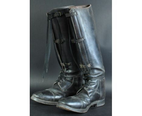 WWI First World War Interest - a pair of period black leather boots with large calf sections, and lace-up and leather strap s