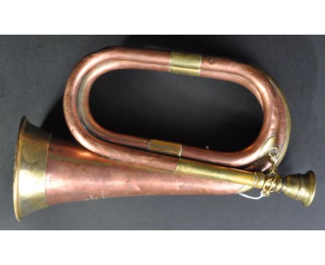 Of WWI First World War Interest - a 1910 dated Boy Scout's brass and copper bugle, made by Henry Potter &amp; Co of London. E