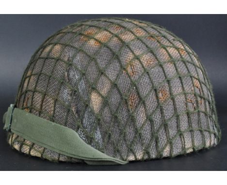 A 20th Century British Army issued Airborne Parachutists or Tank Driver's uniform helmet. Fibre helmet, with hessian covering