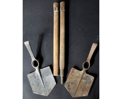Two WWII Second World War British Army entrenching tools - one dated 1944 with maker's marks for Elwell, and stamped with bro